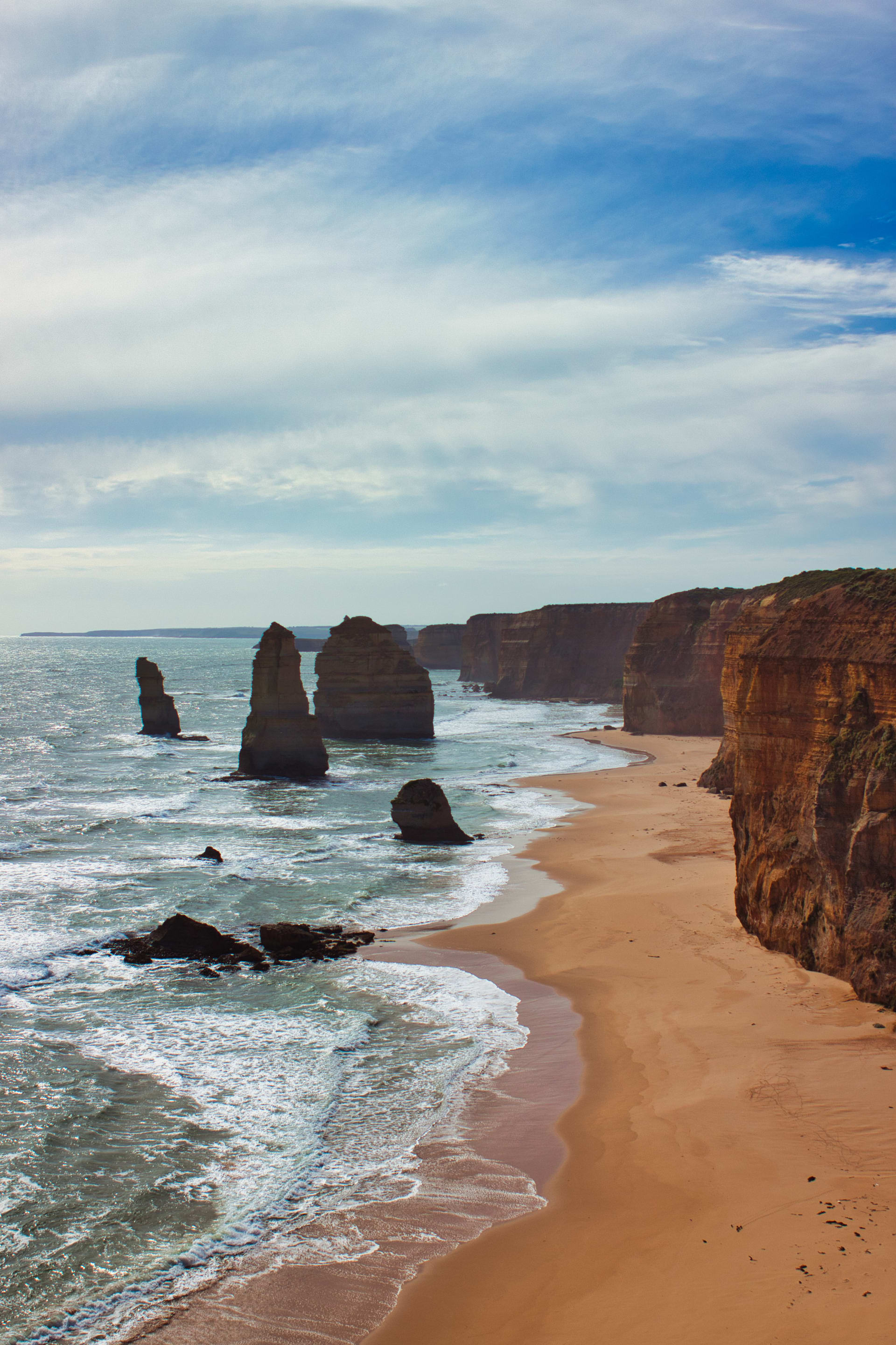 The Twelve Apostles are a collection of limestone stacks off the shore of Port Campbell National Park, by the Great Ocean Road in Victoria, Australia. Unfortunately erosion has taken its toll on this place, so there are only 7 stacks left standing.