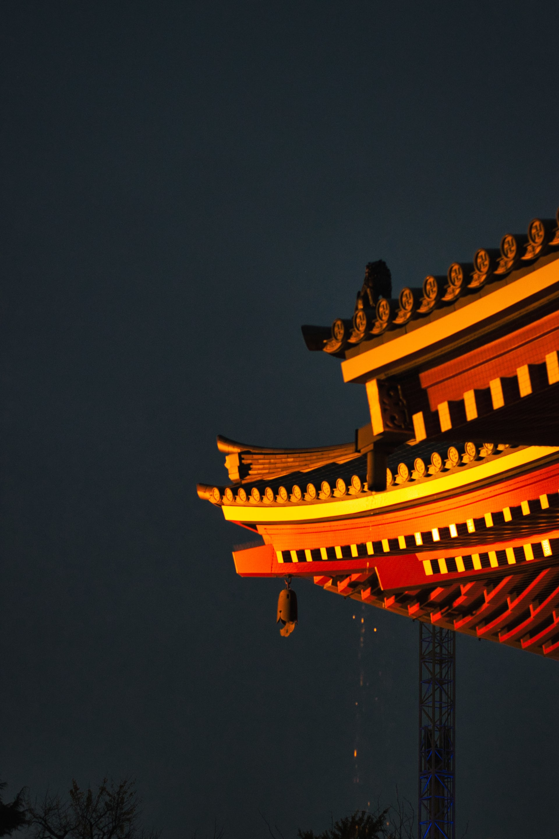 The colorful roof of Sensō-ji contrasts with the rain-darkened skies. From Google Maps: Completed in 645, this temple, Tokyo's oldest, was built to honor Kannon, the goddess of mercy. Local name: 浅草寺.